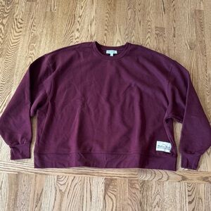 Brand New WEWOREWHAT Maroon Sweatshirt. Size XXXL.